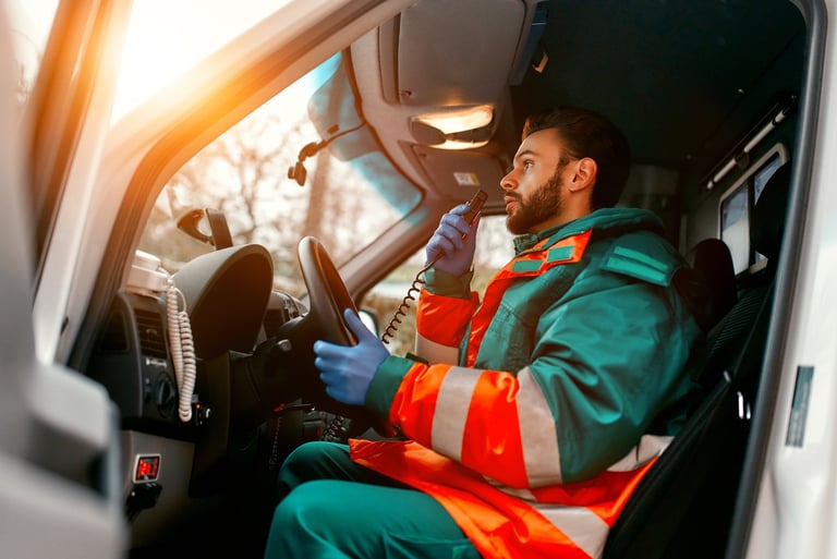 Paramedic on radio outside clinic