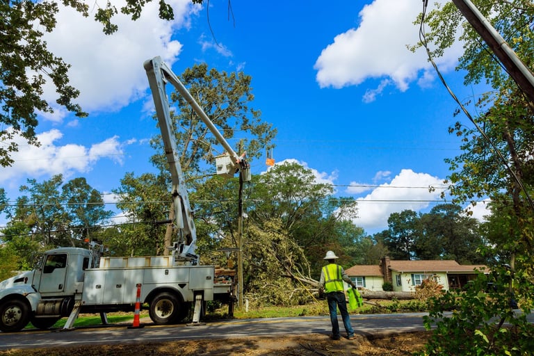 Workers repairing power lines after storm